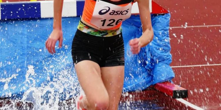 легкоатлети