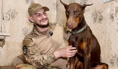 Дмитро Хома зі своїм собакою Амадеусом. Дмитро Хома